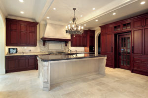 DDBuild-A new wine color mahogany custom kitchen with a large kitchen island
